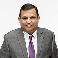 Trustee Asif Malik